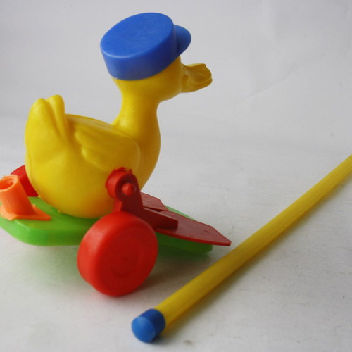 Plastic wheeled vintage 70's duck toy new with stick