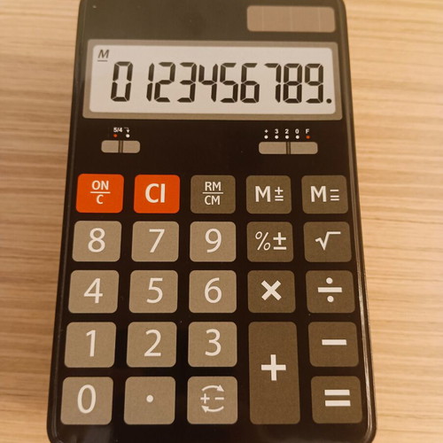 Metal storage box with calculator design, like new