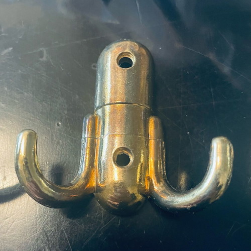 Double and single gold-coloured wall hooks