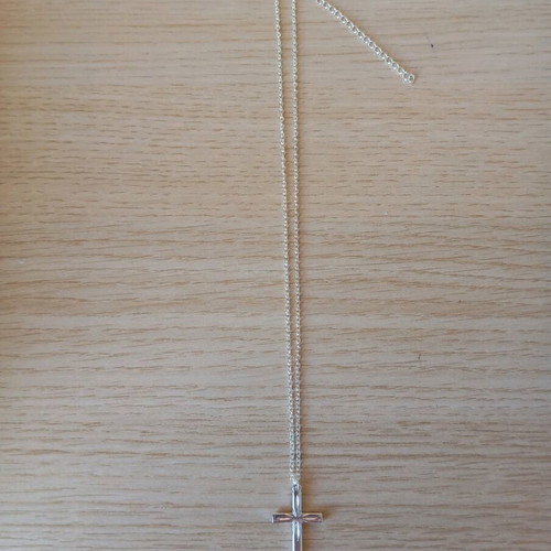 Steel cross like new, silver color