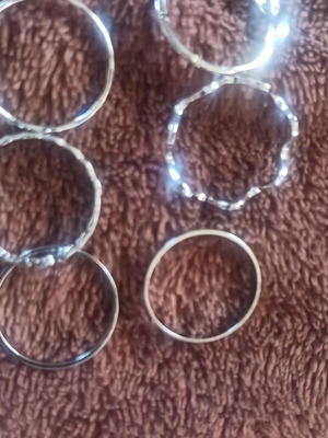 Set of 6 silver rings with different designs