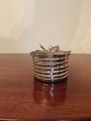 Decorative container used with rust spots