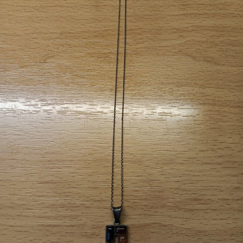 Silver pendant with Baltic amber like new