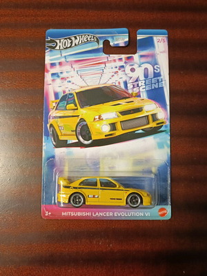Hot Wheels Mitsubishi Lancer EVO VI Yellow New