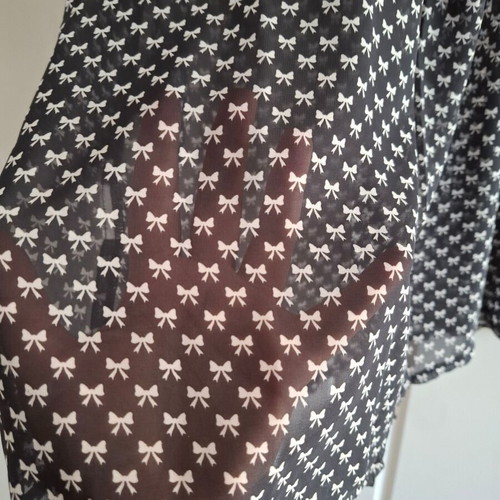 Bellino semi-transparent top with bows size L/XL like new