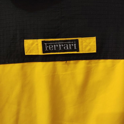 Ferrari Original windbreaker used, size XL, yellow with baby carrier