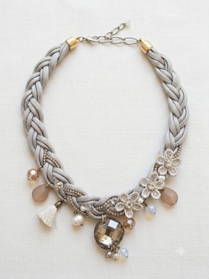 Handmade statement necklace with grey braided cord and fabric flowers