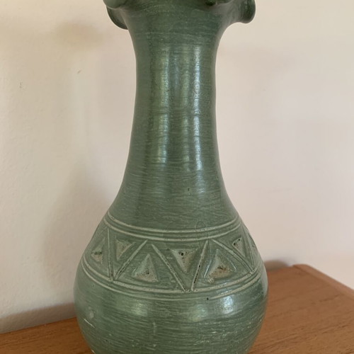 Handmade ceramic vase with carved geometric patterns, like new