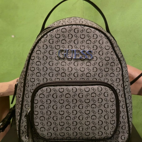Guess women's backpack like new with gift pouch, black and gray