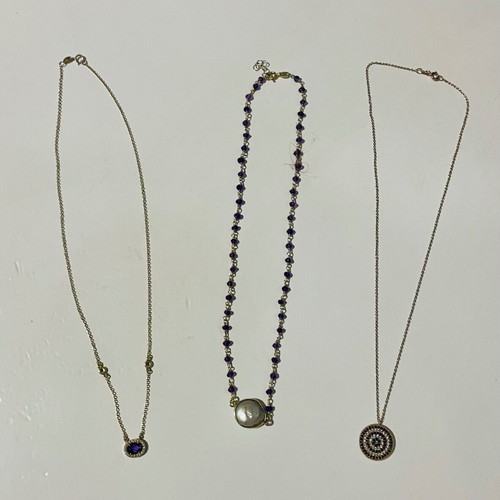 Set of three silver necklaces used