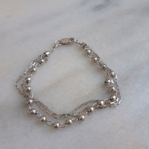Three-strand silver bracelet like new, 20 cm