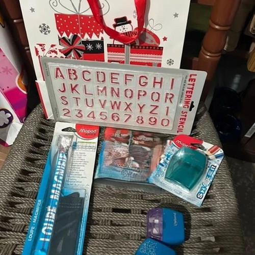 Maped school supplies set with magnifying ruler, stencils, sharpeners, erasers