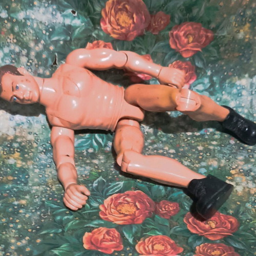 Plastic doll with movable limbs used