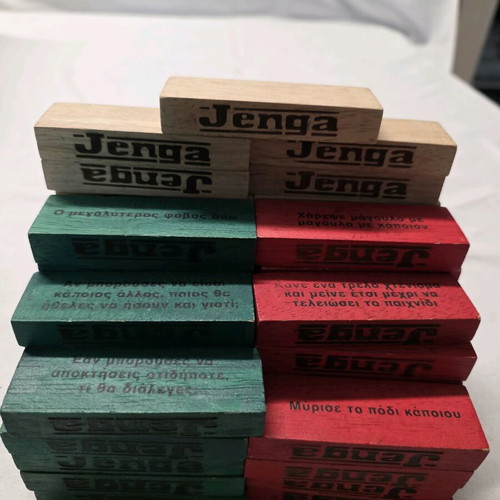 Jenga game used with colorful truth or dare blocks