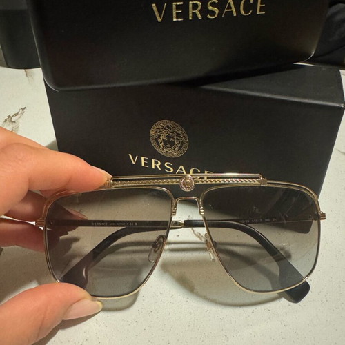 Versace Sunglasses like new, gold men's