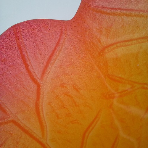 Glass leaf-shaped platter used, orange