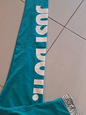 Nike sports leggings turquoise like new size M