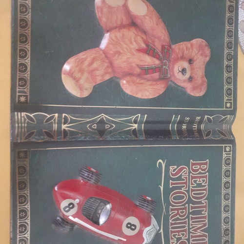 Collectible metal storage box in book style like new
