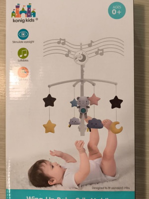 Musical rocking cradle