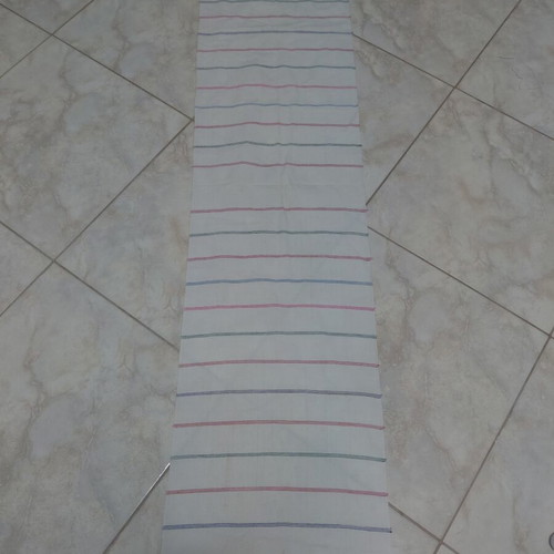Traditional cotton fabric on loom new, white with colorful stripes