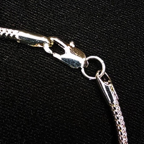 Silver 925 bracelet like new with 4 charms, 20 cm length