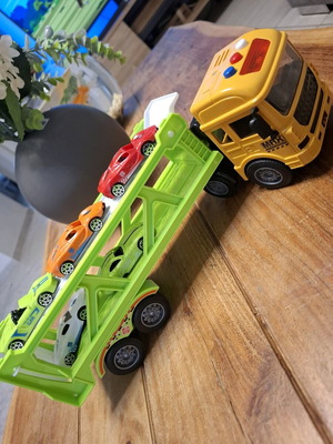 Toy truck with 5 cars with light and sound like new