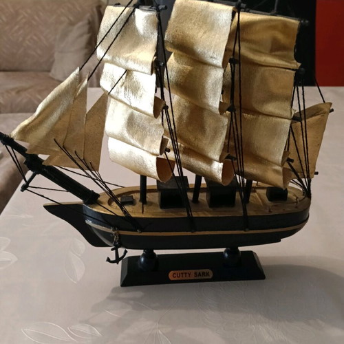 Wooden decorative ship like new with golden sails