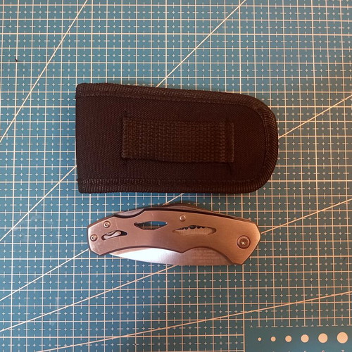 Crivit folding knife with belt sheath, like new
