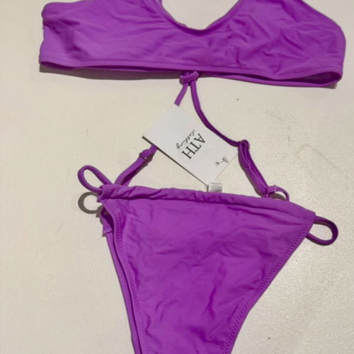 Bikini set new with tags, purple, sizes medium and large