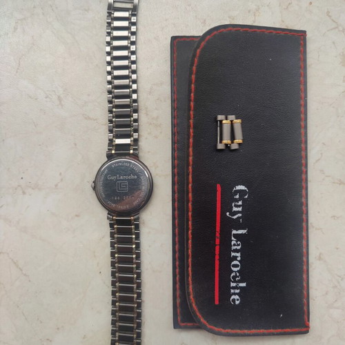 Guy Laroche Stainless Steel and Gold Date and Time Watch used