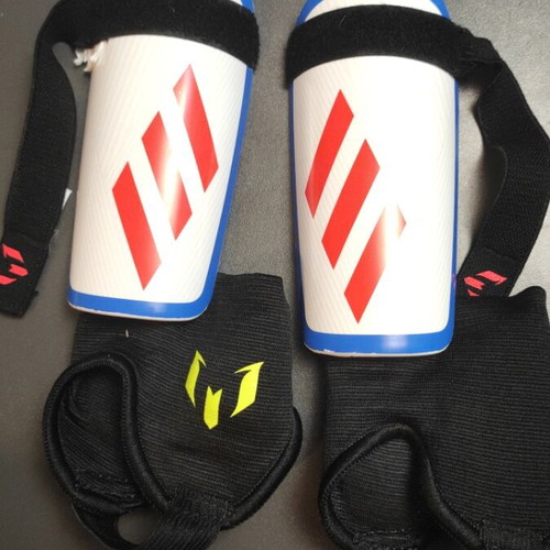 Adidas "MESSI" shin guards size small like new