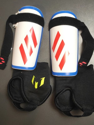 Adidas "MESSI" shin guards size small like new