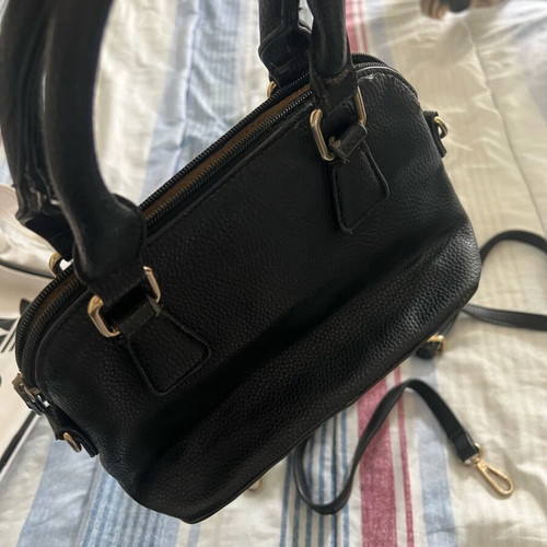 Small handbag used with additional strap, black