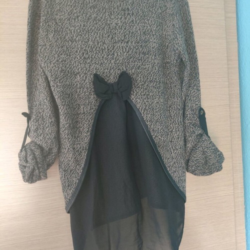 Knitted blouse with transparency used, back detail and leather neck