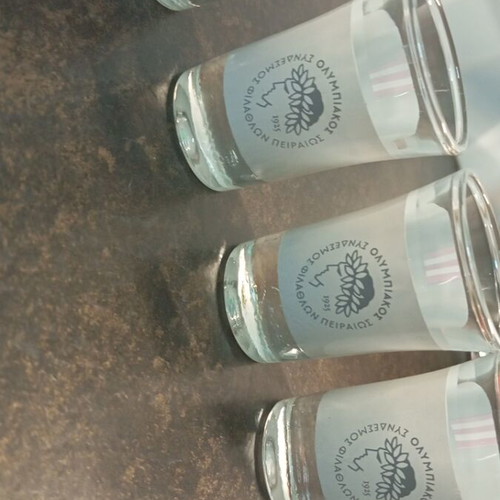 Olympiacos collectible beer + 4 shot glasses