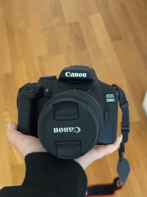 Canon EOS 2000D Full Kit like new with tripod, LED light, 2 batteries and bag