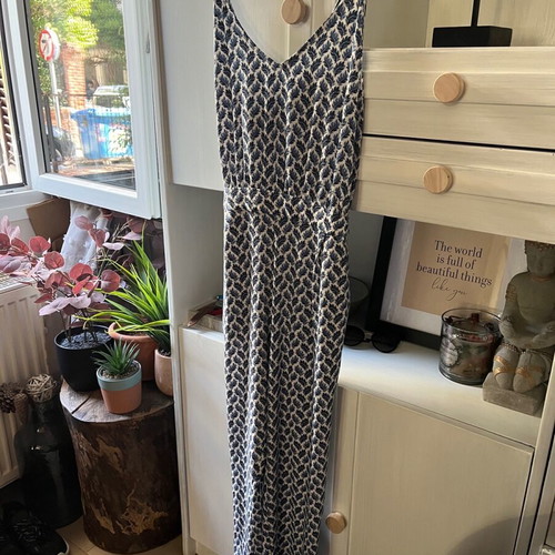 One-piece jumpsuit like new, size S-M with adjustable straps