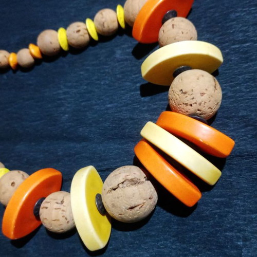 Alternative necklace made of cork with orange beads used