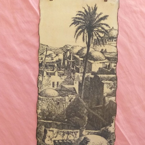 Wall-mounted old woodcut of the old city of Jerusalem