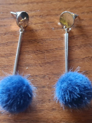 Faux hanging earrings with blue fluffy balls like new