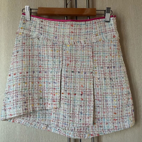 Mini tweed skirt with cutouts like new, XS