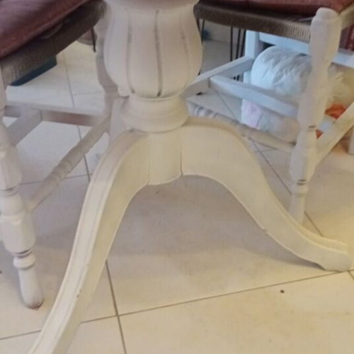 Vintage round dining table with 3 wooden chairs and rattan seats