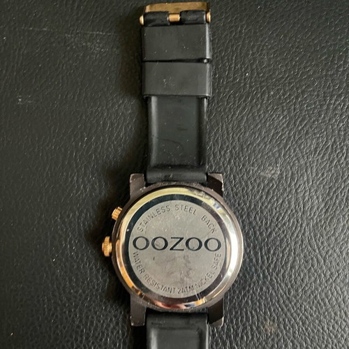 Ouzoo watch used for parts or repair