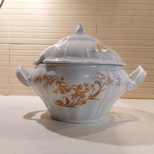 Porcelain soup tureen used with gold floral details