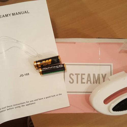 Steamy handheld steam device like new for clothes and curtains