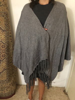 Gray poncho used with fringes