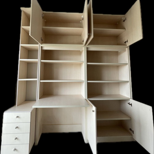 Bookcase desk with shelves, cabinets, drawers and office chair used