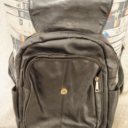 Backpack bag used, black faux leather