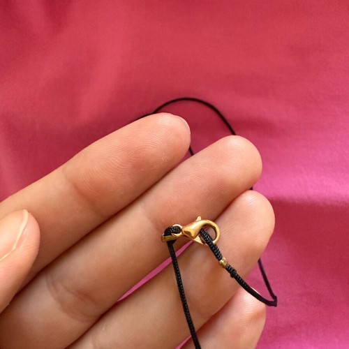 Necklace new, black and yellow