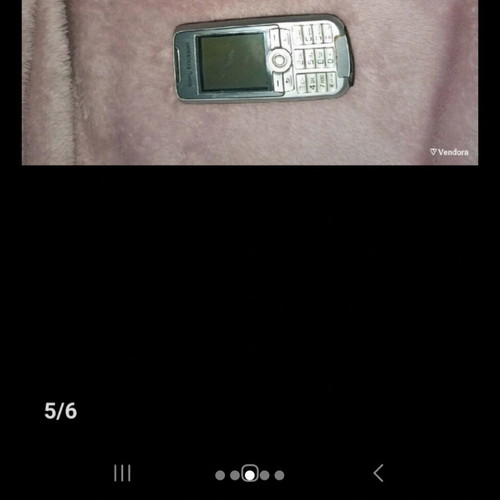 Old mobile phone used, no charger, unknown if working